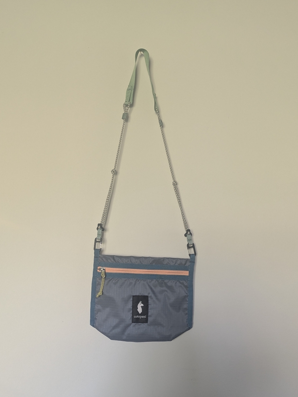 Cotopaxi Blue Gray Crossbody with Coral Zip and Teal Trim